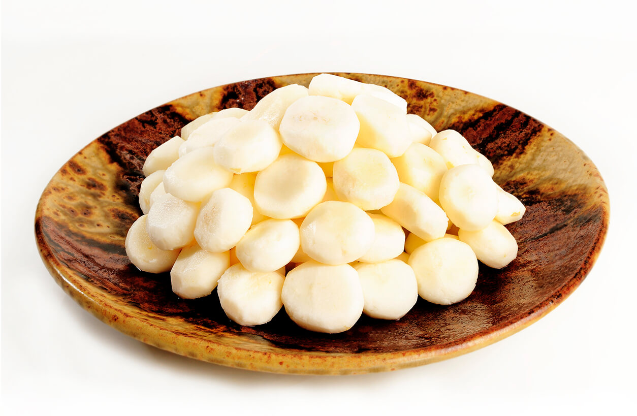 Peel Raw Water Chestnut on Wooden Plate